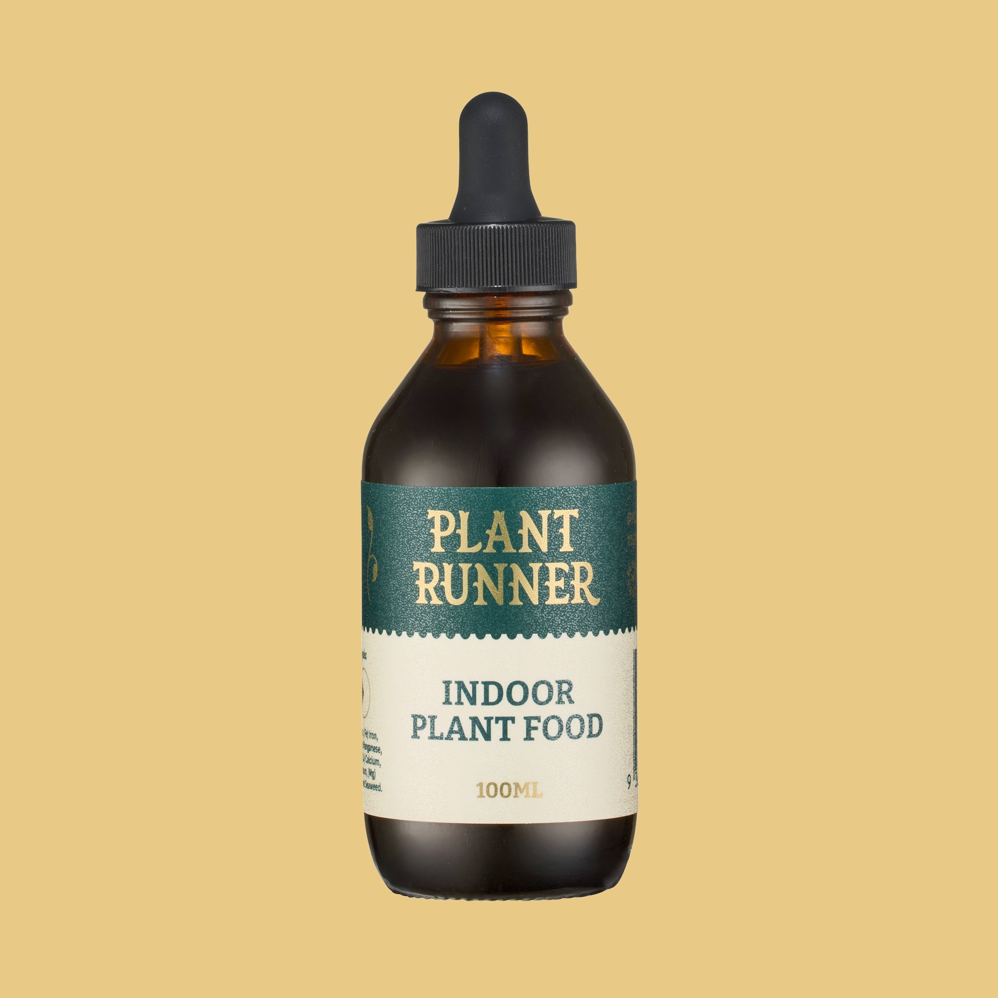 Bottle of Plant Runner indoor plant food on a beige background