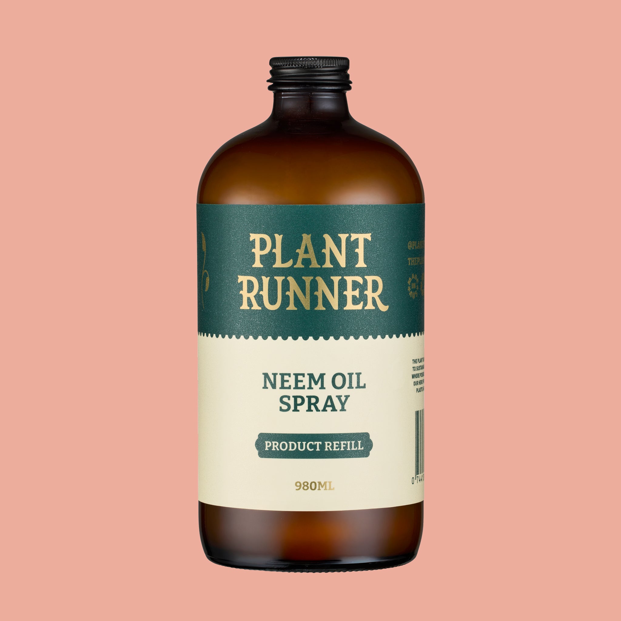 Bottle of Plant Runner Neem Oil Spray on a pink background
